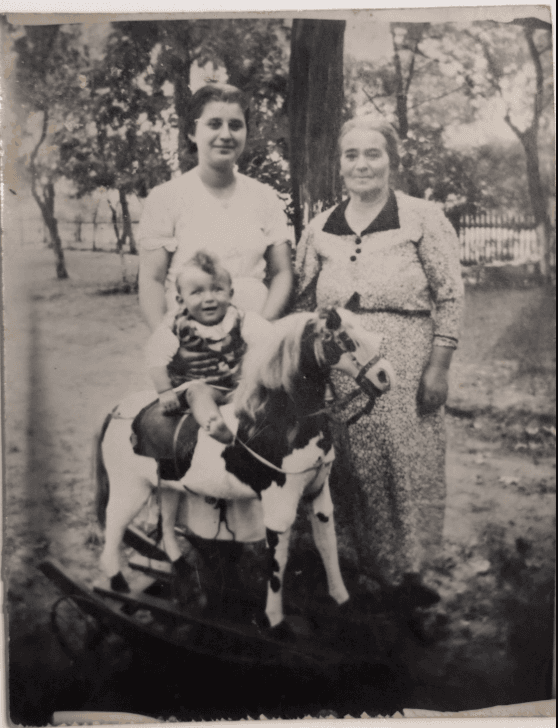 Aged family portrait of Raisel, Laike and their son