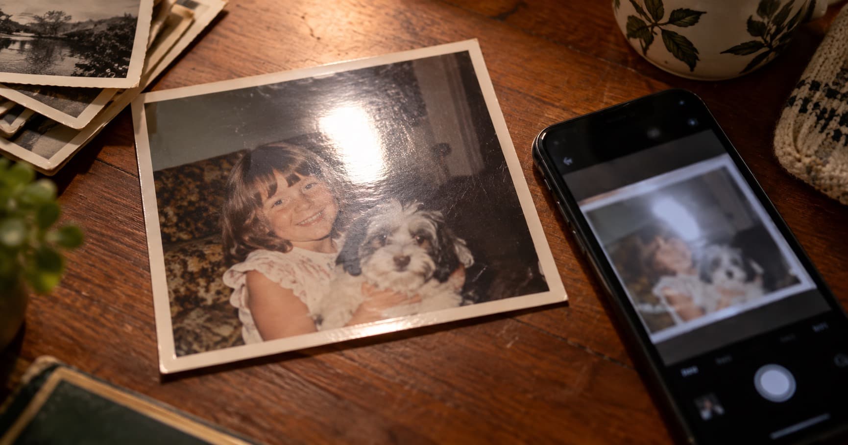 A glossy old photograph being scanned without glare